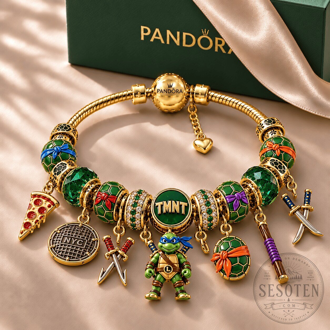 Teenage Mutant Ninja Turtles Gold Charm Bracelet with Pizza and Katana Charms